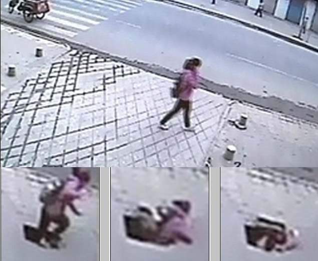 Camera quan sát trên vỉa hè ghi hình cô gái bị lọt hố